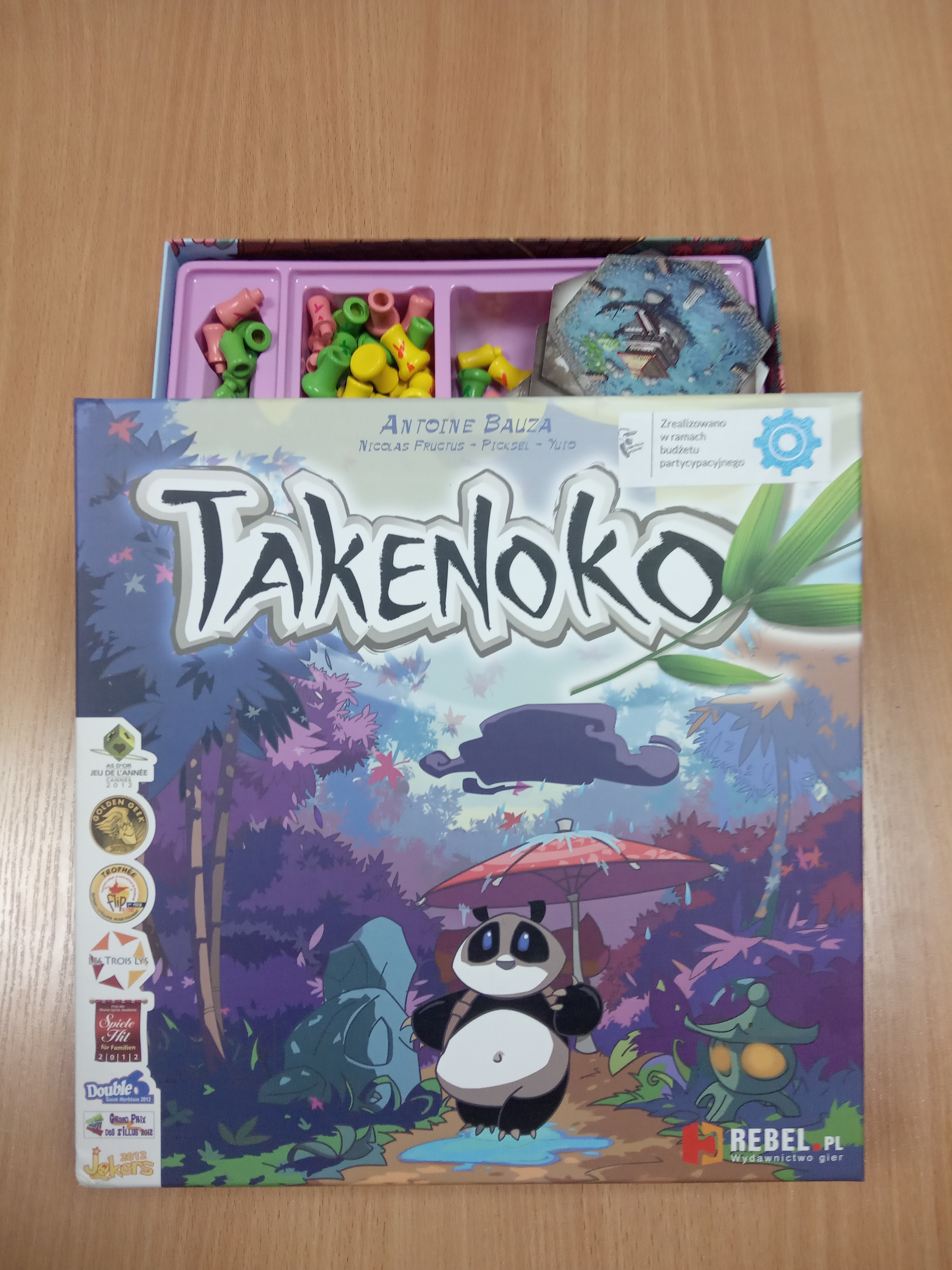 Opakowanie gry planszowej o nazwie: Takenoko
